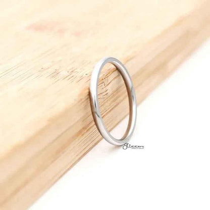 Glossy mirror-polished stainless steel plain band ring, 2mm wide, from Glitters stainless steel rings collection.