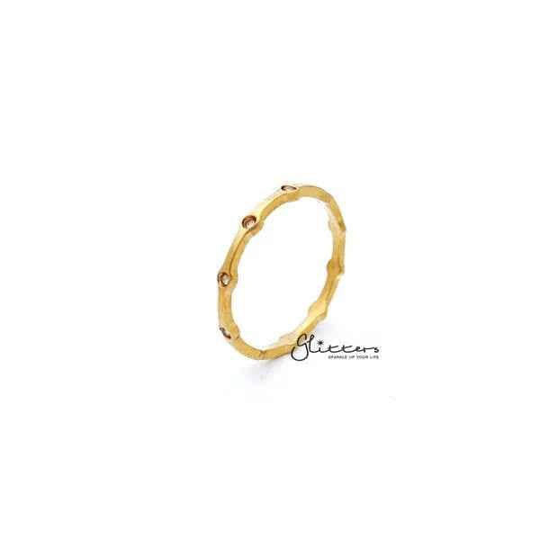 Glitters 18K gold plated stainless steel women's ring with CZ dot design, stylish jewelry for elegant accessory wear.