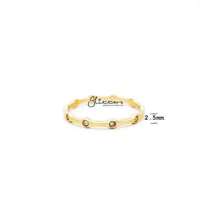 Glitters 18K gold plated stainless steel women's ring with CZ dot accents, stylish and elegant jewelry piece.