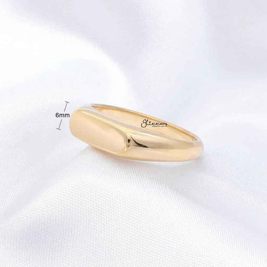 Gold stainless steel rectangle signet ring by Glitters, showcasing a sleek, polished band with a rectangular face.