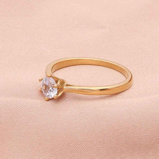 Gold stainless steel wedding engagement ring with five cubic zirconia stones, designed by Glitters.