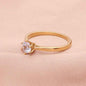 Gold stainless steel wedding engagement ring with five cubic zirconia stones, designed by Glitters.