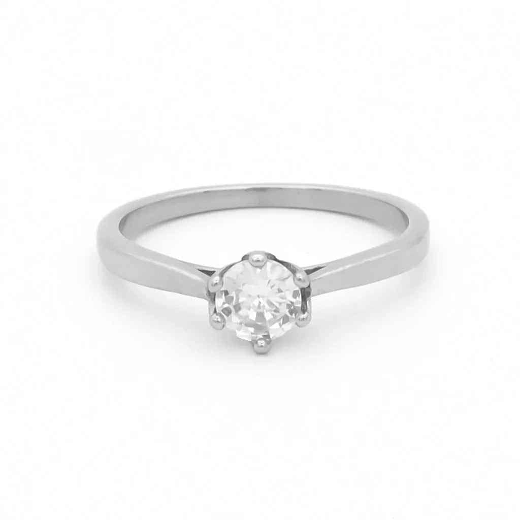 Silver stainless steel wedding engagement ring with cubic zirconia stones, featuring a sleek and elegant design by Glitters.