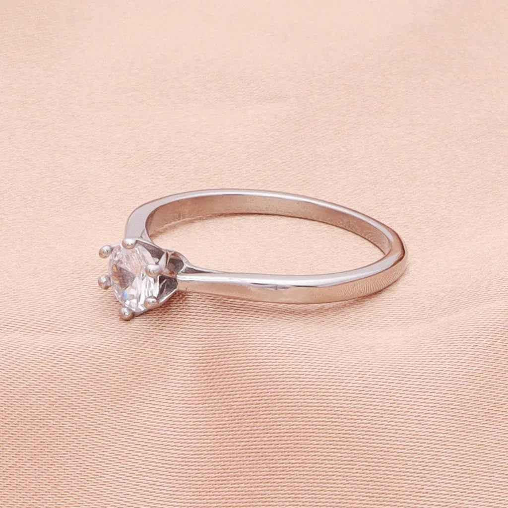 Silver stainless steel wedding engagement ring with five cubic zirconia stones, designed by Glitters.