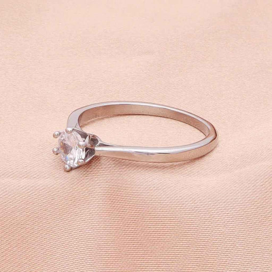 Silver stainless steel wedding engagement ring with five cubic zirconia stones, designed by Glitters.