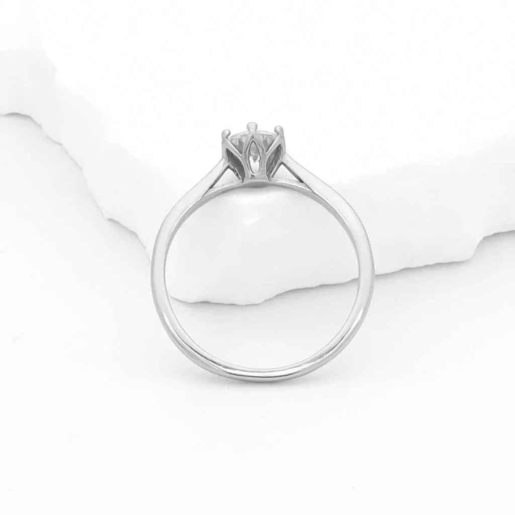 Silver stainless steel wedding engagement ring with cubic zirconia stones by Glitters, showcasing a sparkling, elegant design.