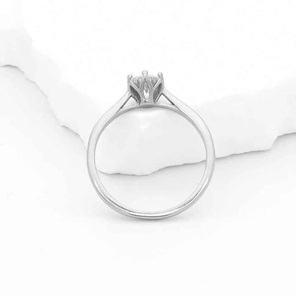 Silver stainless steel wedding engagement ring with cubic zirconia stones by Glitters, showcasing a sparkling, elegant design.