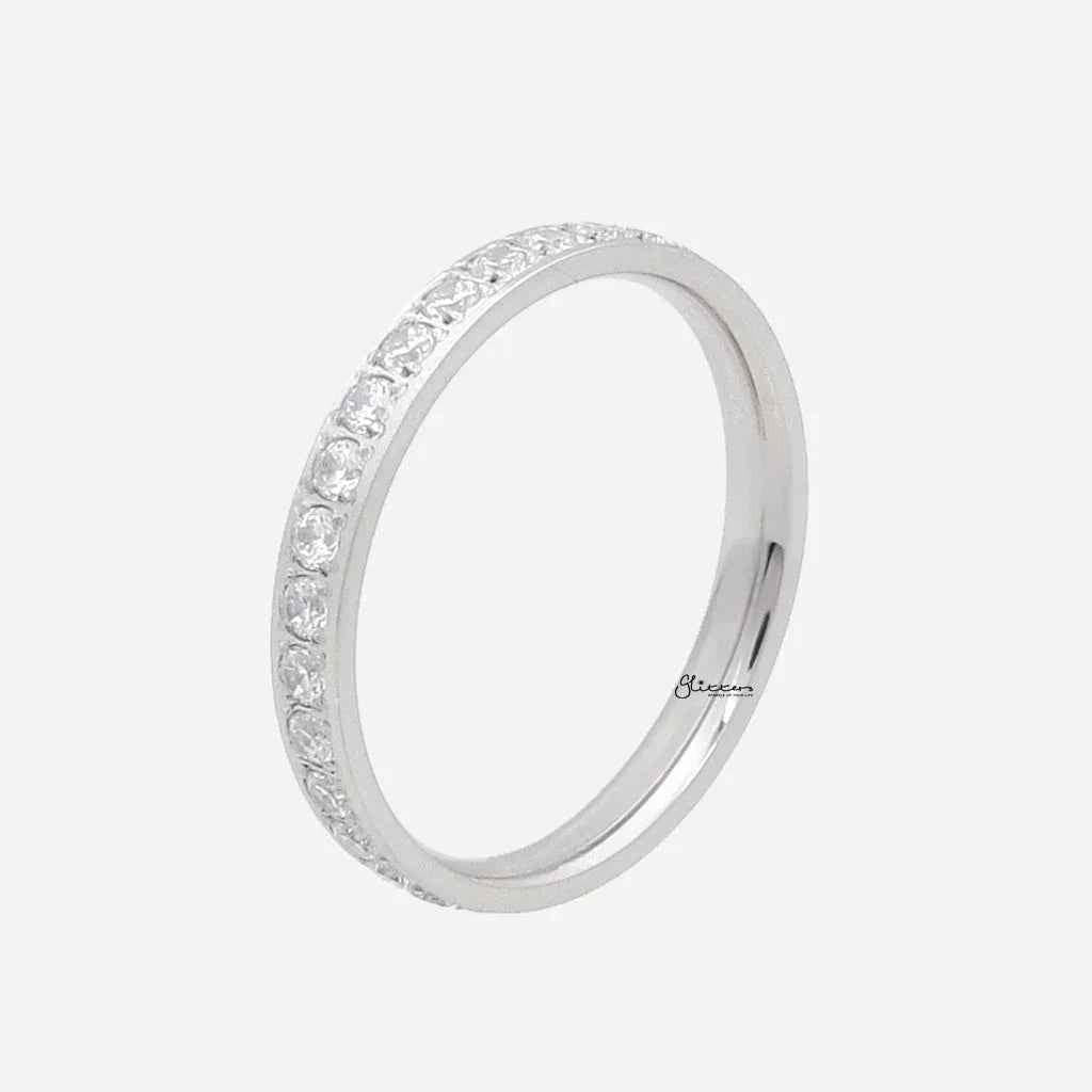 Silver CZ fully inlay stainless steel band ring by Glitters, showcasing a sleek design with sparkling CZ stones and polished finish.