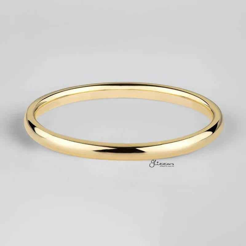 Gold plated stainless steel band ring with a 2mm wide glossy mirror polish, from Glitters stainless steel rings collection.