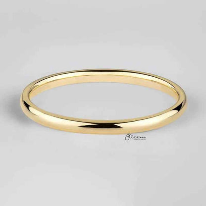 Gold plated stainless steel band ring with a 2mm wide glossy mirror polish, from Glitters stainless steel rings collection.