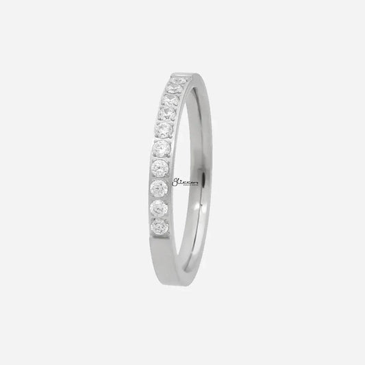 Silver stainless steel ring by Glitters with inlaid 10 cubic zirconia stones, elegant band design for versatile wear.