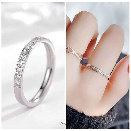 Silver stainless steel band ring by Glitters with 10 CZ inlay, showcasing a sleek, modern design and sparkling gemstone accents.
