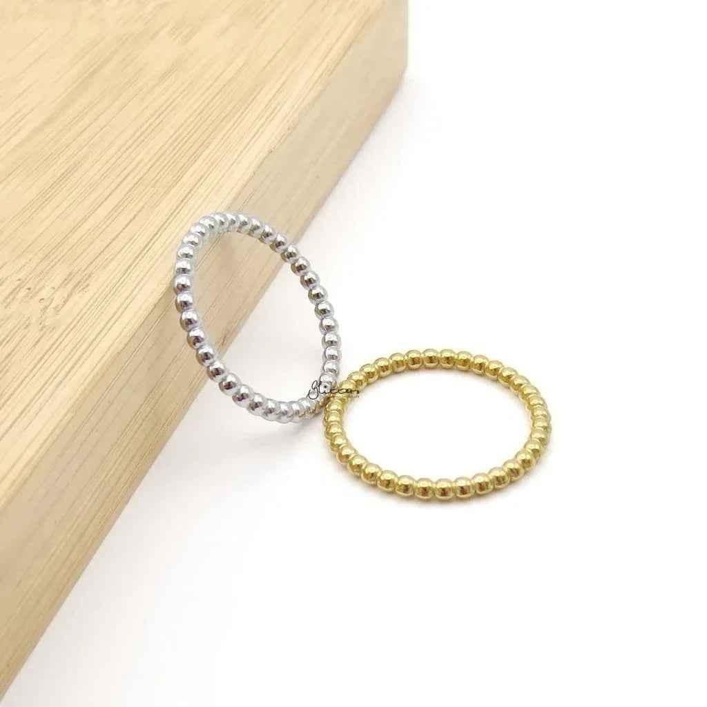 Gold stainless steel bead stacking ring from Glitters, featuring a smooth, rounded design ideal for stacking or everyday wear.