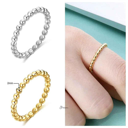 Silver stainless steel bead stacking ring by Glitters, featuring a sleek design with multiple small beads for a modern look.