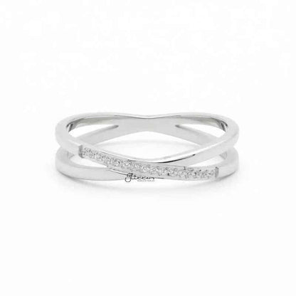 Silver stainless steel criss cross X ring by Glitters, showcasing a sleek, modern design with polished finish.