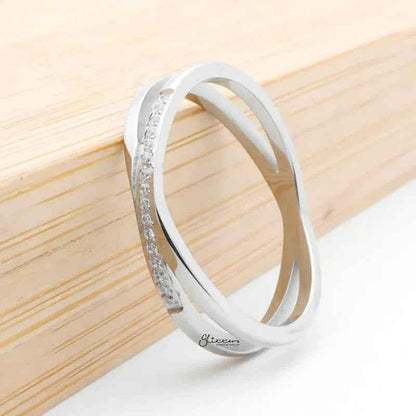 Silver stainless steel criss-cross X ring by Glitters, showcasing a sleek, modern design with a polished finish.