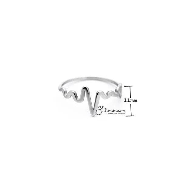 Stainless steel heartbeat and heart women's rings by Glitters, featuring sleek designs and polished finishes.