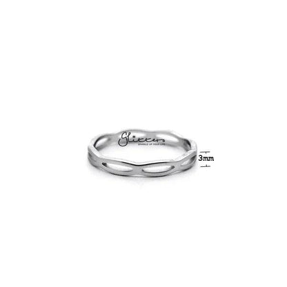 Set of stainless steel overlapping wavy women's rings by Glitters, showcasing layered, shiny silver ring designs.