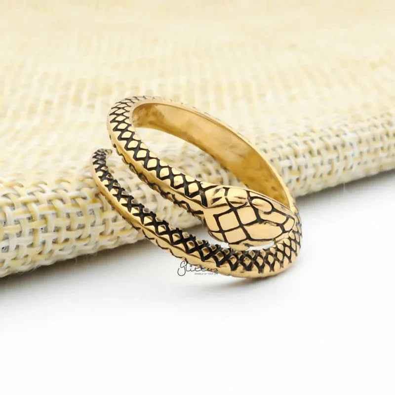 Gold stainless steel snake ring by Glitters featuring a sleek, polished design with intricate snake detailing.