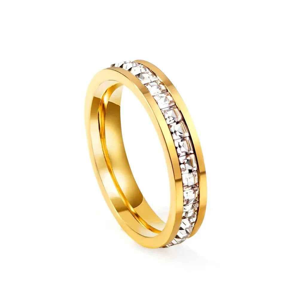 Gold stainless steel square CZ paved band ring from Glitters, featuring a modern geometric design and sparkling stone accents.