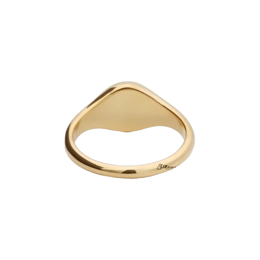 Gold stainless steel sunburst signet ring from Glitters, featuring a detailed sunburst design on a sleek band.
