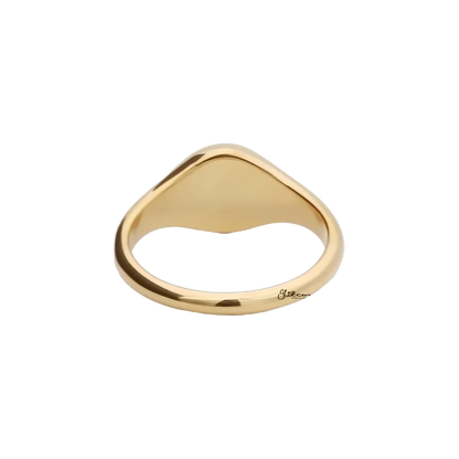 Gold stainless steel sunburst signet ring from Glitters, featuring a detailed sunburst design on a sleek band.