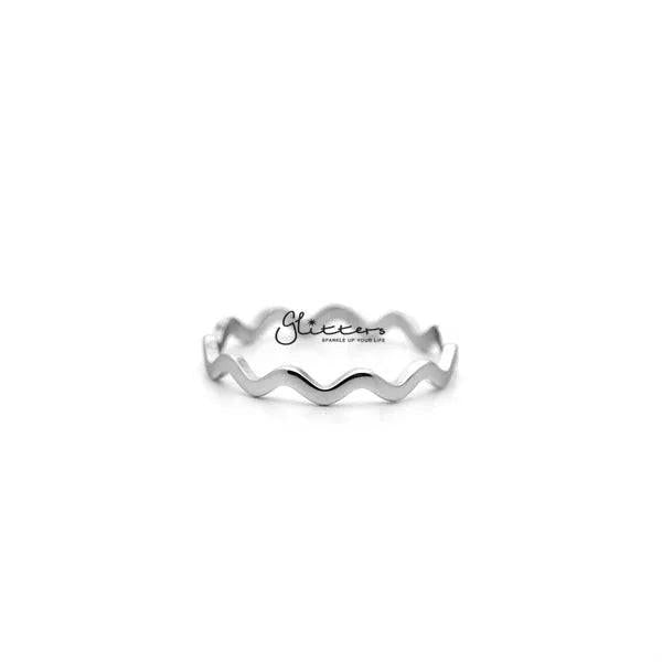 Silver stainless steel wavy women's ring by Glitters, showcasing a sleek and modern design with a shiny silver finish.