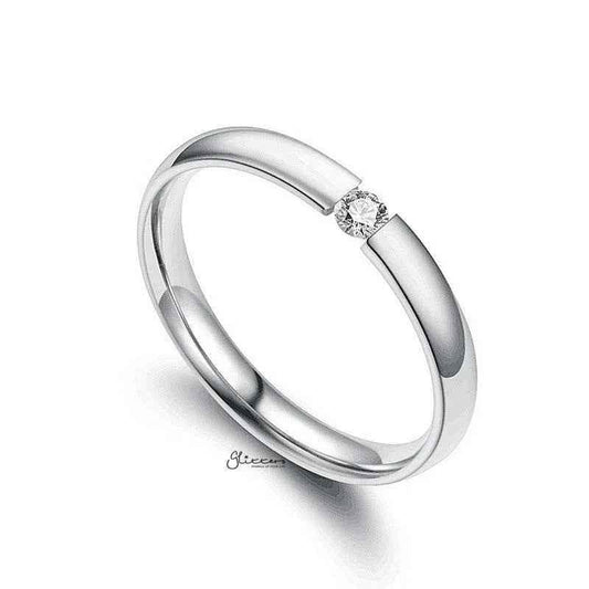 Silver stainless steel tension set ring with 3mm wide glossy mirror polished band and cubic zirconia accents by Glitters