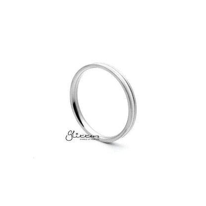 White enamel filled center stainless steel women's ring by Glitters, showcasing a sleek silver band with a white enamel detail.