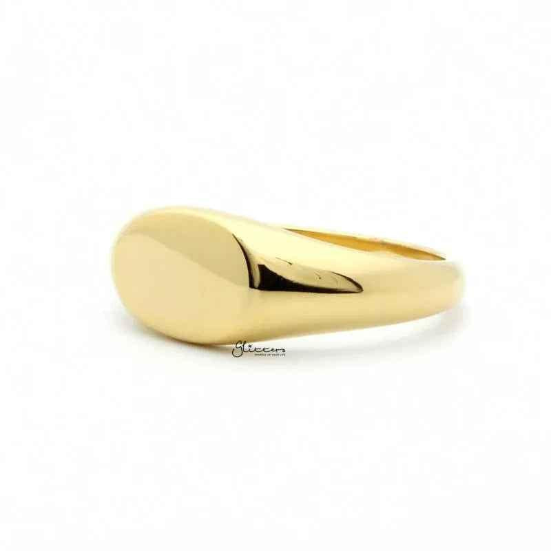 Gold stainless steel oval signet ring from Glitters with a polished finish, stylish and durable accessory for men and women.