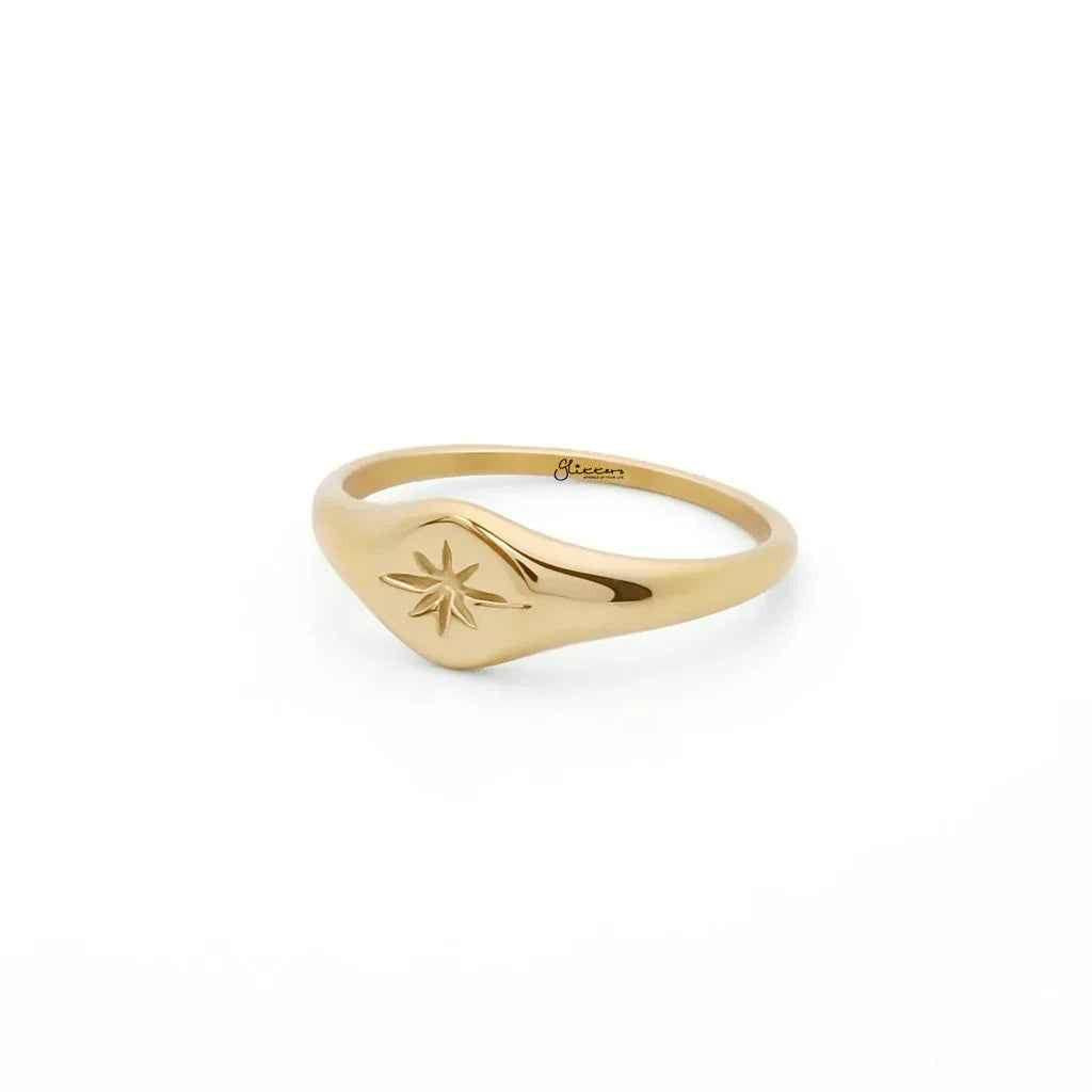 Gold stainless steel oval sunburst signet ring by Glitters, featuring a polished, intricate sunburst design on a sleek band.