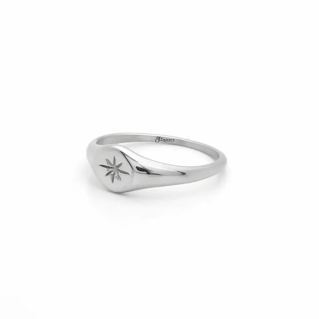 Silver stainless steel oval sunburst signet ring from Glitters, featuring a polished, decorative design on a durable band.