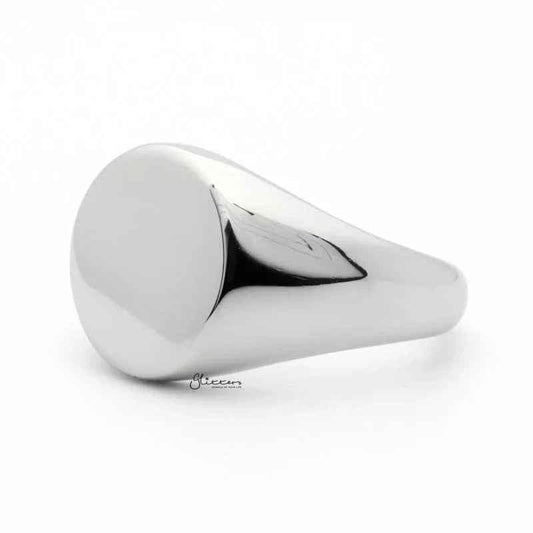Silver stainless steel round signet ring by Glitters, featuring a smooth polished finish and classic design.