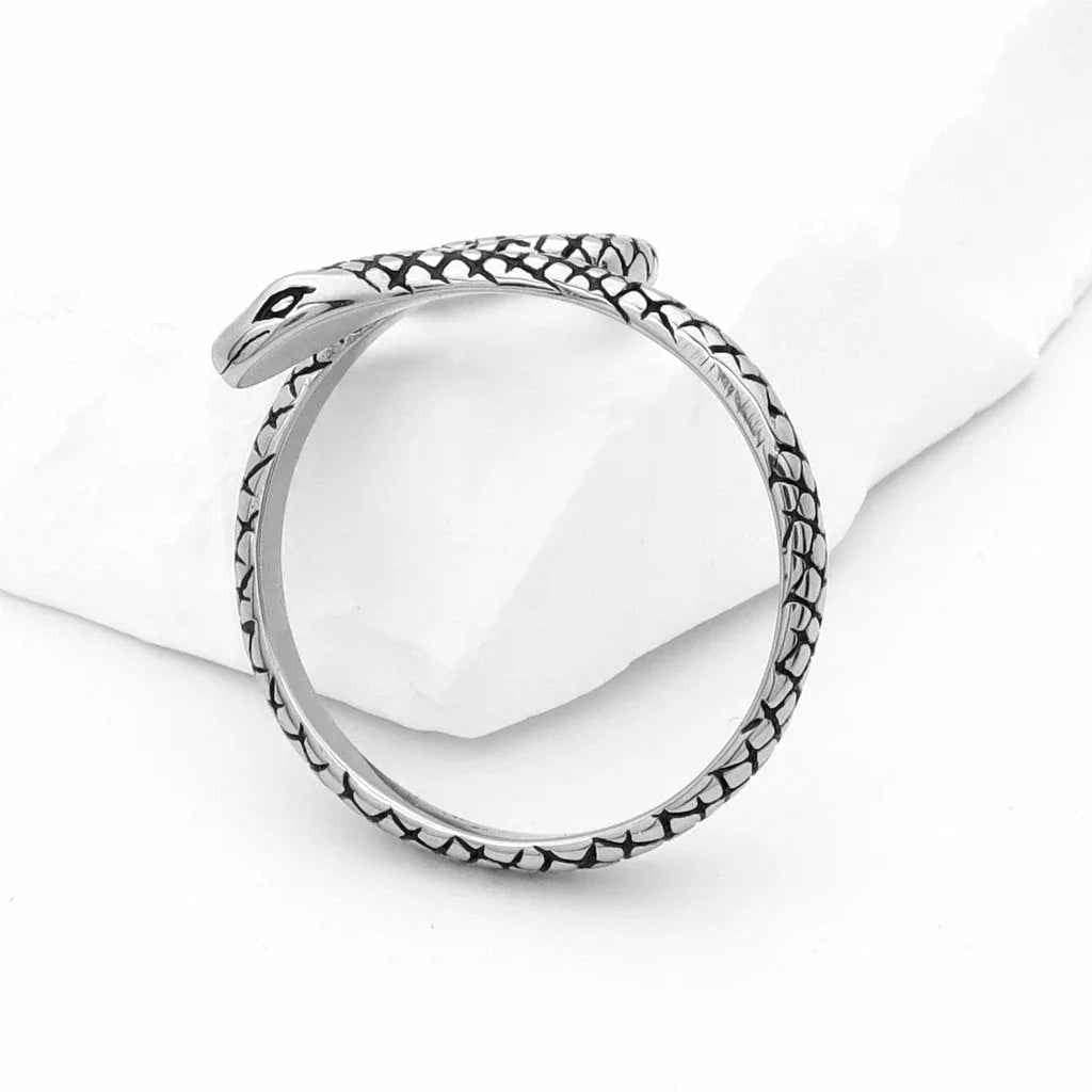 Stainless steel snake ring from Glitters, featuring a sleek, polished design with a serpent motif, perfect for stylish jewelry.