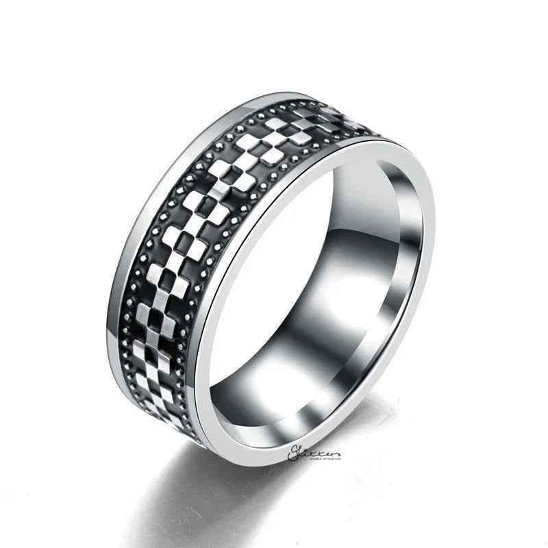 Stainless steel checkerboard band ring by Glitters, featuring a sleek, polished finish and geometric checkerboard pattern.