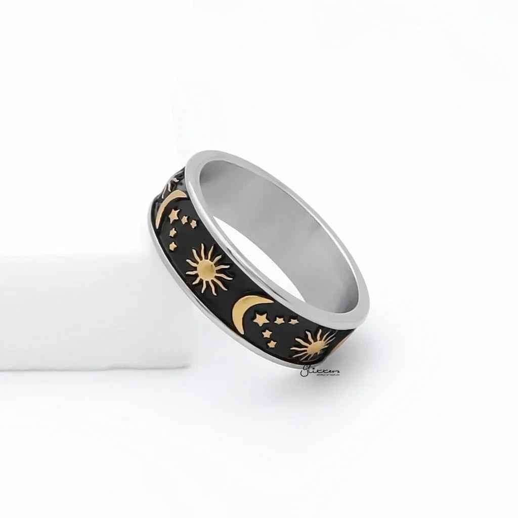 Gold stainless steel Sun Moon Stars ring by Glitters featuring celestial designs on a sleek band.