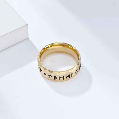 Gold stainless steel Viking Norse rune ring by Glitters, featuring intricate Norse rune engravings on a sleek band.