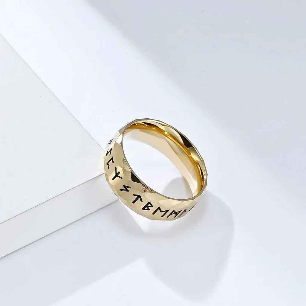 Gold stainless steel Viking Norse rune ring by Glitters featuring intricate Norse symbols and detailed craftsmanship.