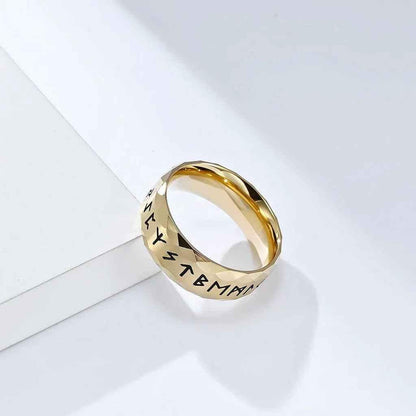 Gold stainless steel Viking Norse rune ring by Glitters featuring intricate Norse symbols and detailed craftsmanship.