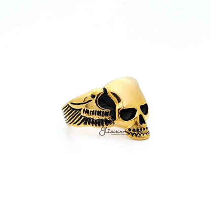 Stainless steel men's ring with 18K gold IP skull with wings design, cast in a bold, detailed style by Glitters.
