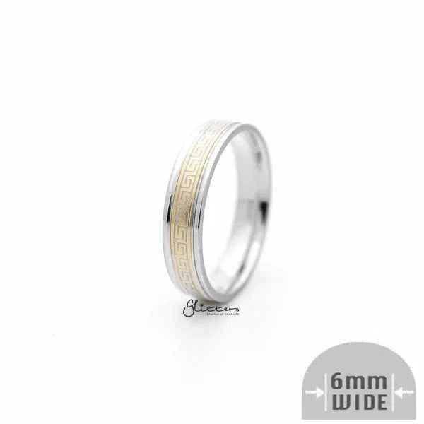 6mm silver Greek key stainless steel band ring by Glitters on a gold background, showcasing intricate design and polished finish.