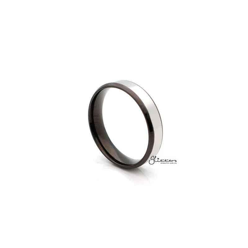 Stainless steel black 2-tone polished center band ring, 6mm wide, by Glitters, showcasing a sleek, stylish ring design.