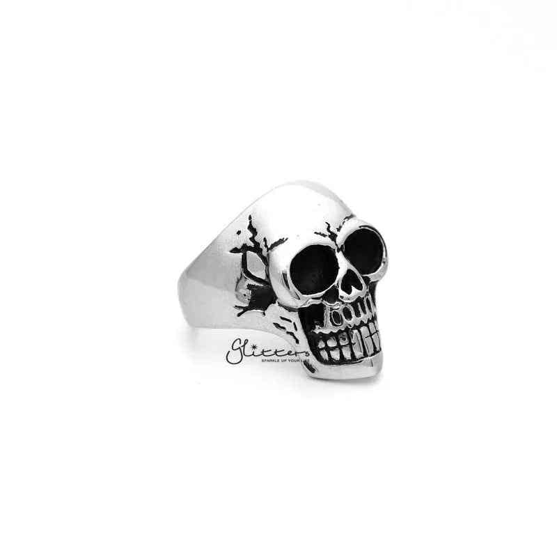 Antiqued stainless steel skull head men's ring by Glitters, featuring a detailed classic skull design on a polished metal band.