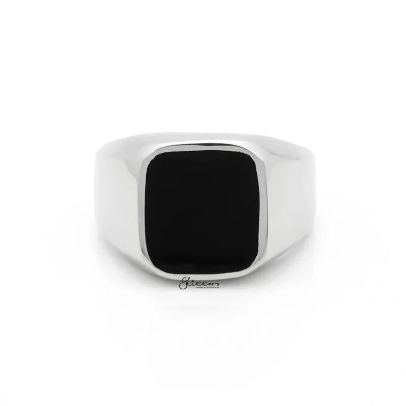 Black square flat top stainless steel signet ring by Glitters, showcasing a sleek silver finish and bold geometric design.