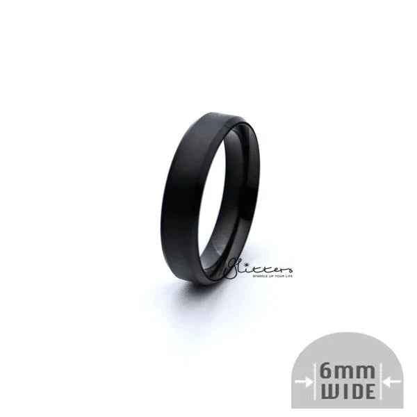 Black titanium ion-plated stainless steel 6mm wide beveled edge band ring from Glitters, showcasing a sleek, polished design.