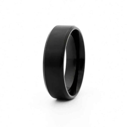 Black titanium ion-plated stainless steel 8mm wide beveled edge band ring from Glitters, showcasing sleek, polished design.