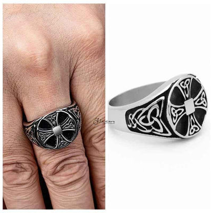 Stainless steel Celtic Cross ring with Celtic knot symbols, featuring intricate engraved designs on a sleek band.