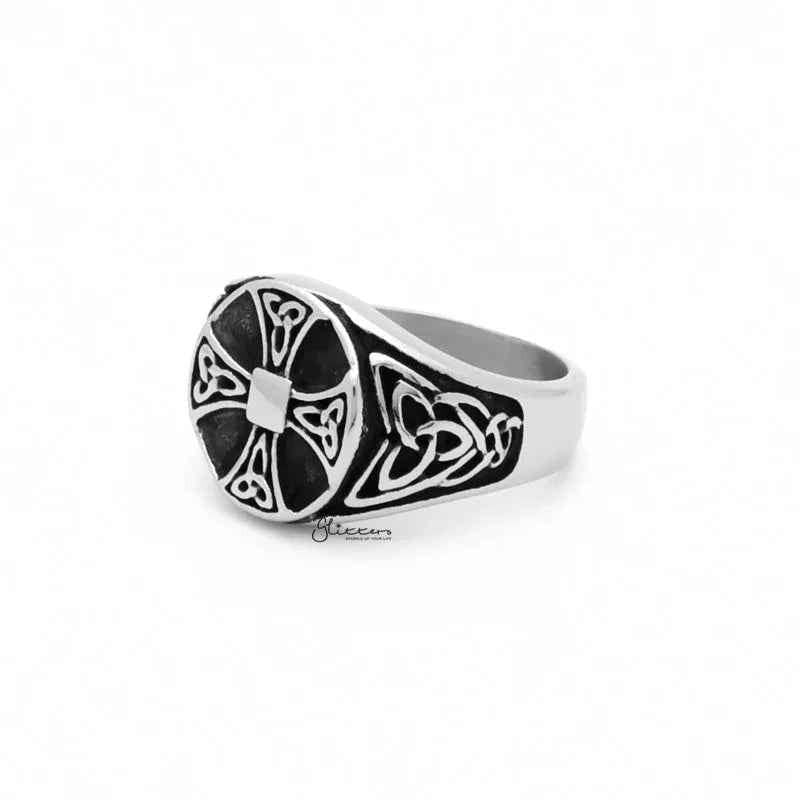 Celtic Cross stainless steel ring with Celtic knot symbols, featuring intricate engraved design on a polished band.