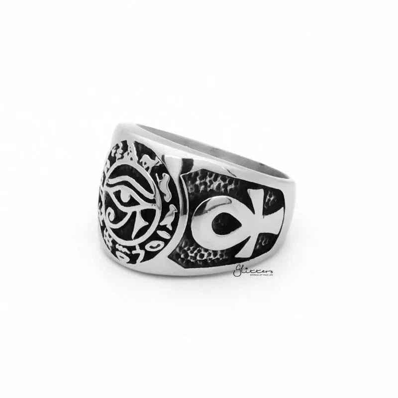 Egyptian Eye stainless steel ring with Ankh symbols, featuring intricate design and polished silver finish, by Glitters.