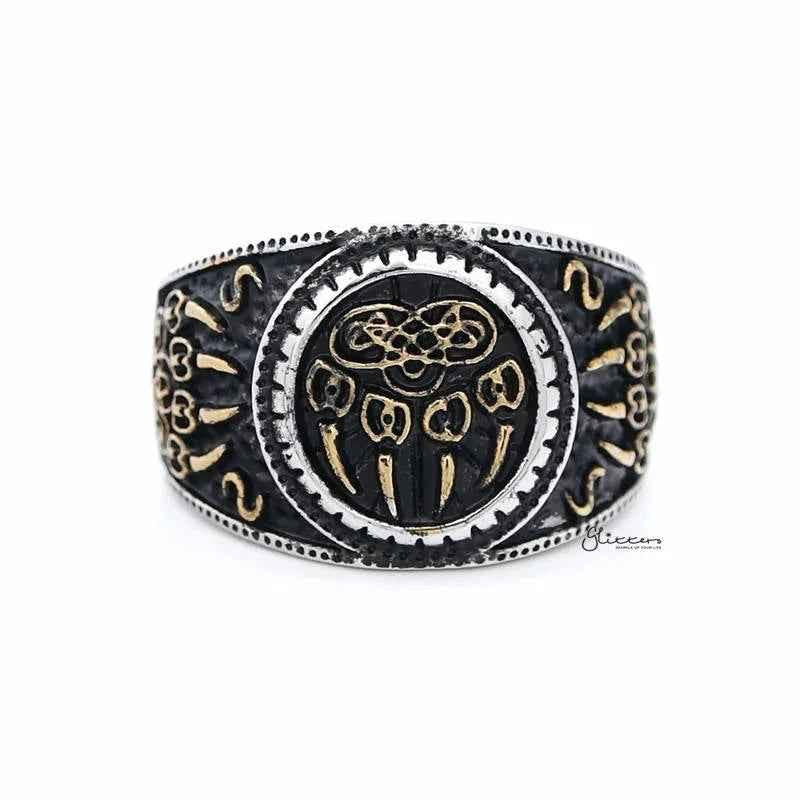 Two-tone stainless steel men's ring with gold claws on a black circular background, featuring a sleek and modern design.